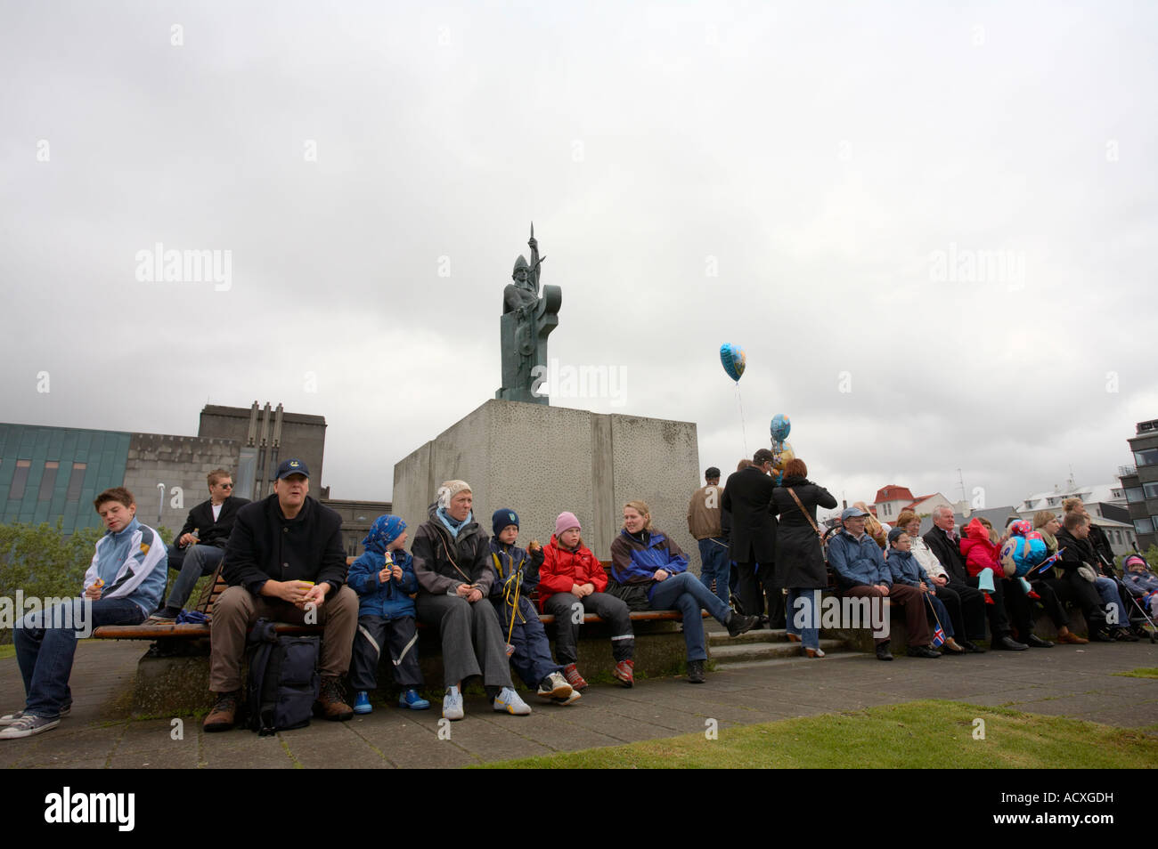 People gathered around the Statue of Ingólfur Arnarson on the Icelandic National Day, Arnarhóll, Reykjavík, Iceland Stock Photo