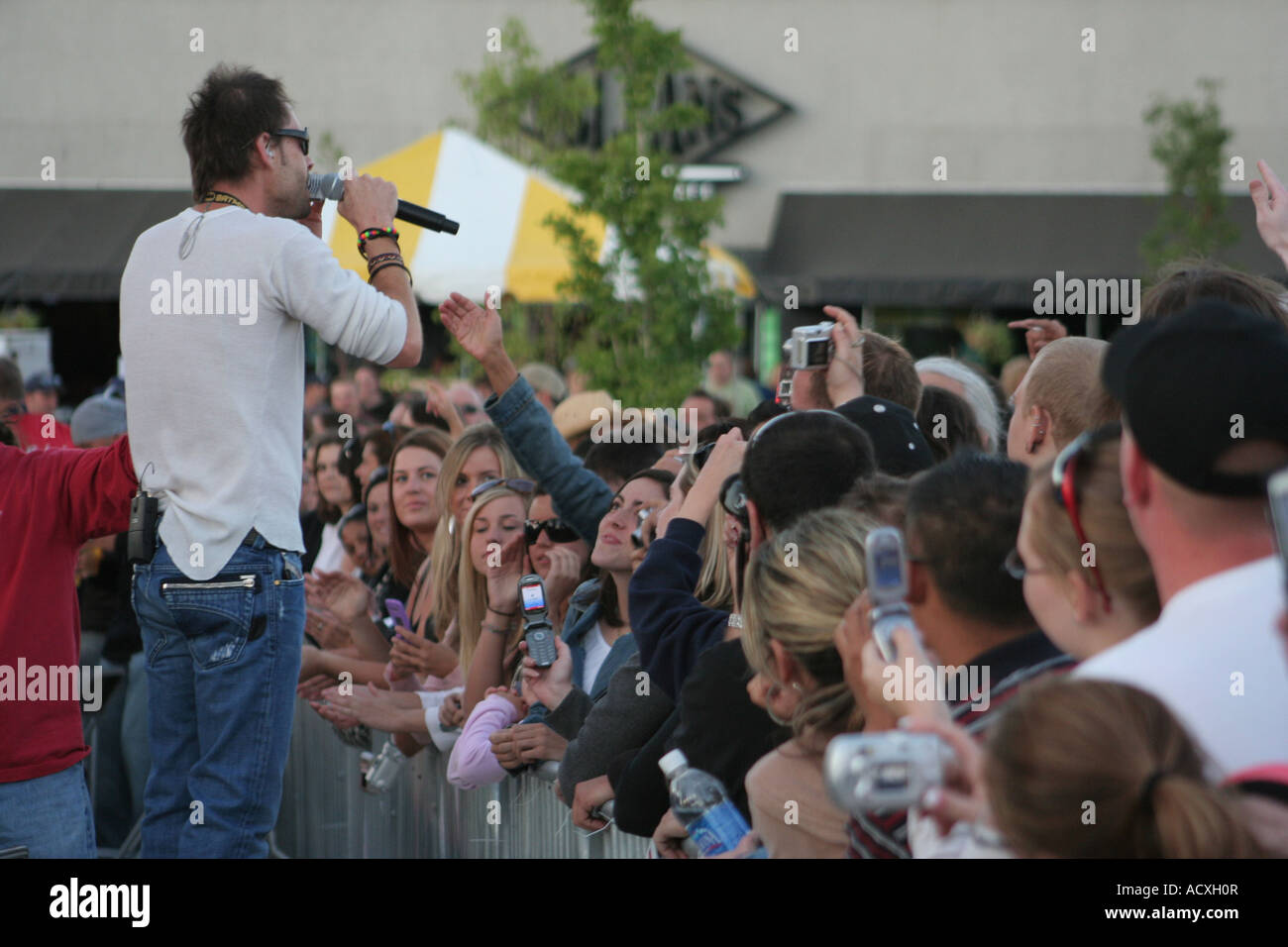 Gin Blossoms lead singer and frontman Robin Wilson looking out into a