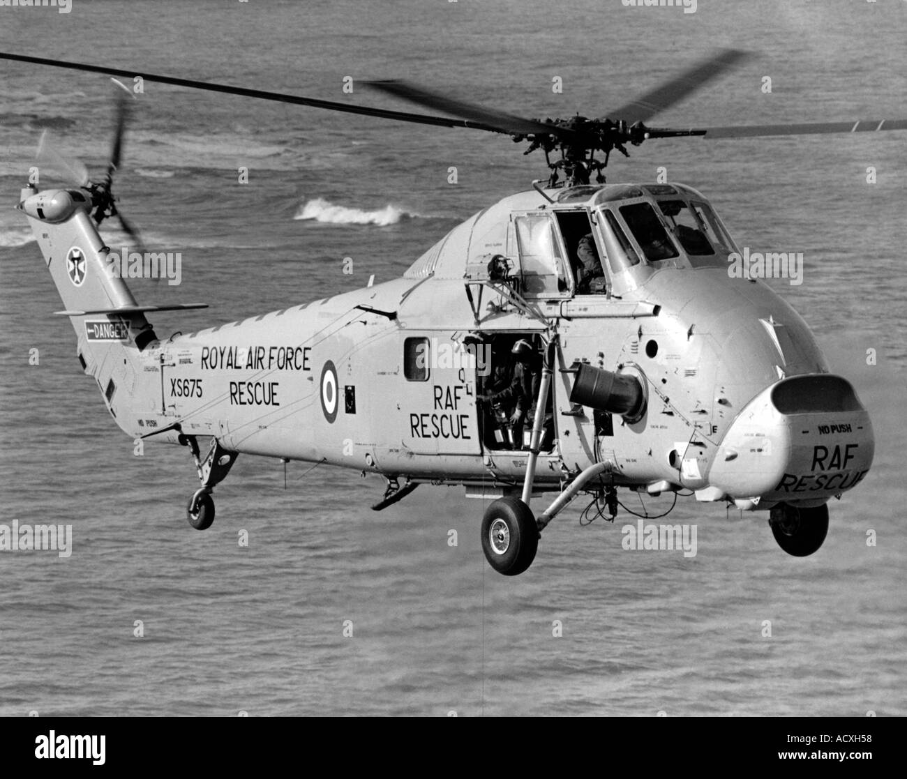 Wessex Air Sea Rescue helicopter from 1980 s in flight over the sea at Flamborough North Yorkshire Stock Photo