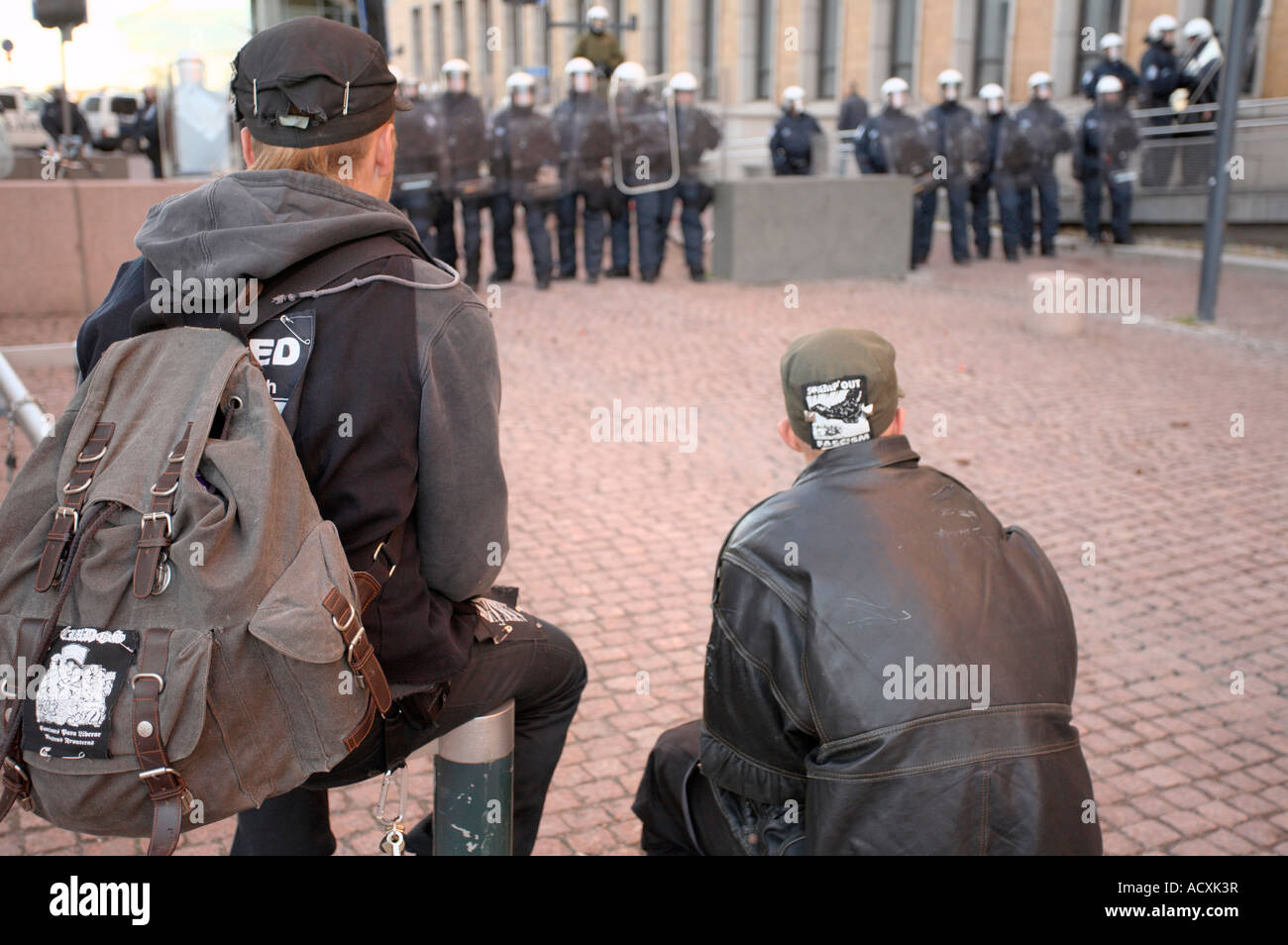 Police officers in riot gear and people at ASEM demonstration, Helsinki, Finland, EU Stock Photo