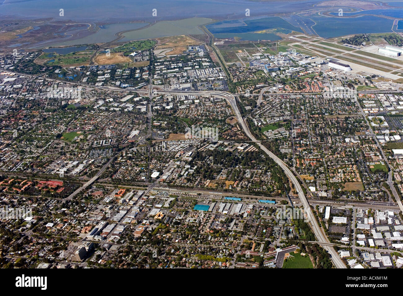 aerial view above Mountain View, CA toward San Francisco Bay highway 85 and a portion of Moffett Field in the background Stock Photo