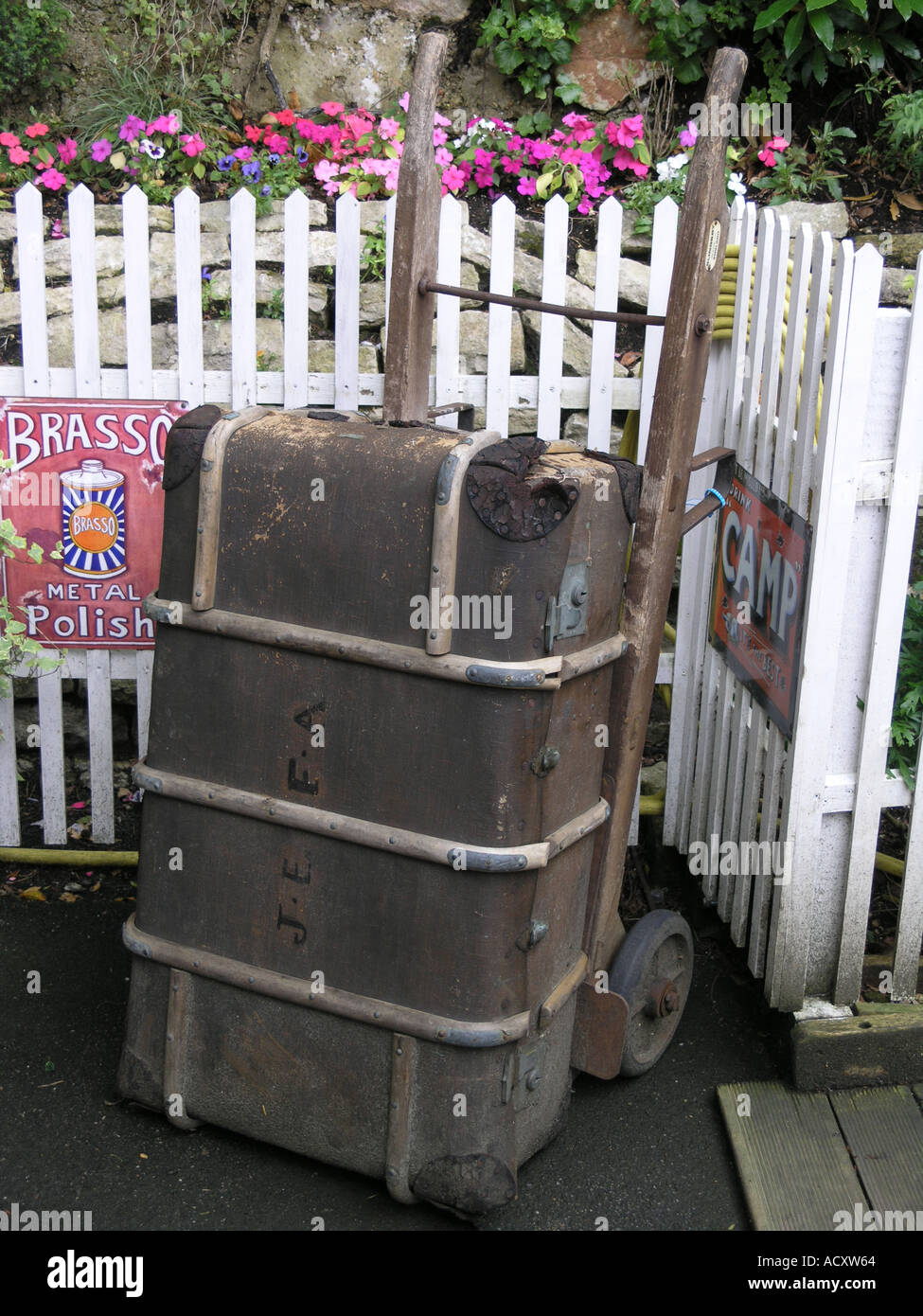 Old fashioned luggage trolley at a railway station Stock Photo - Alamy