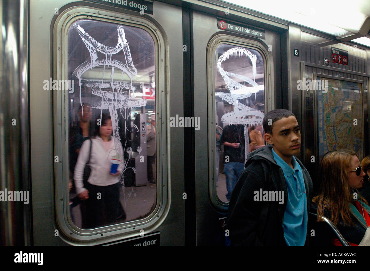 Acid Etched grafitti on New York City Subway cars Stock Photo - Alamy
