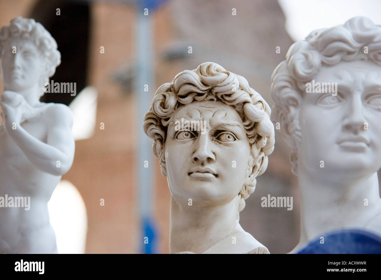 Statues of David souvenirs near the roman Colosseum Rome Italy Stock