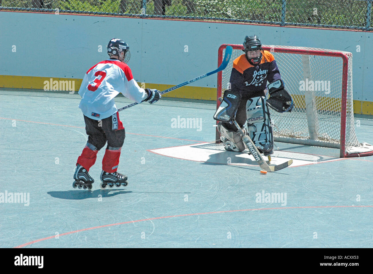 Game on inline skates of Roller Hockey between local teams without Ice