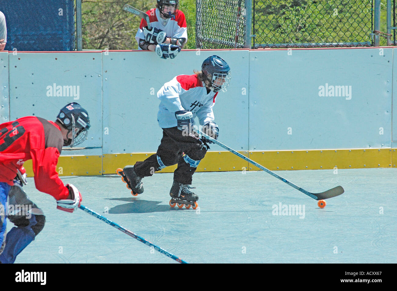 Game on inline skates of Roller Hockey between local teams without Ice Hockey option in a warm
