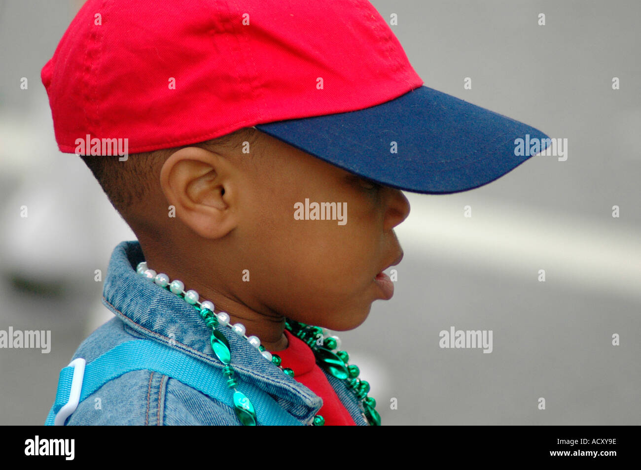 Young real black boy at Saint St Patrick Day parade in Atlanta Georgia USA  America with ball cap hat 4 years old with family event Stock Photo - Alamy