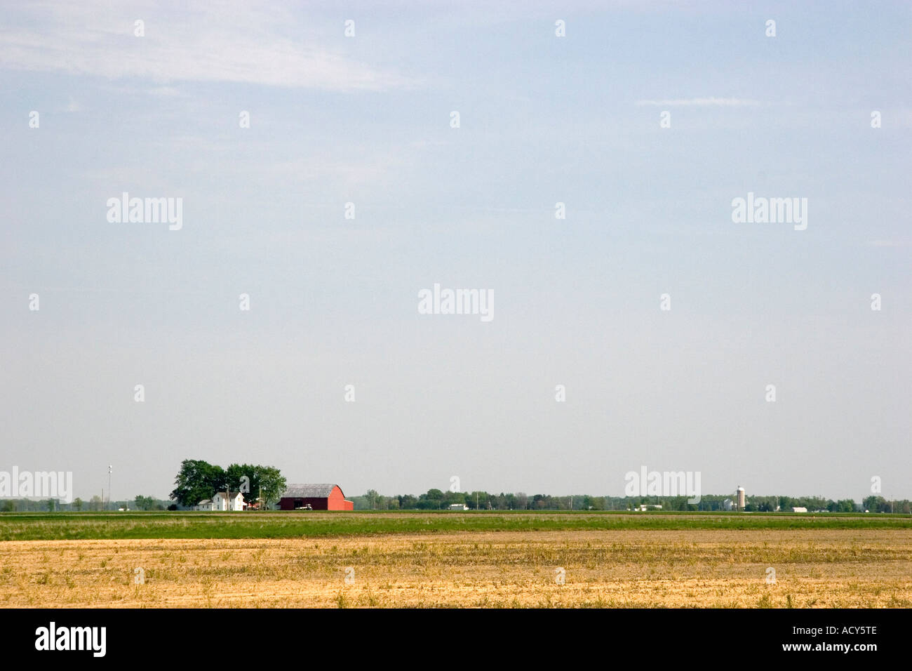 Red barn and farm in the plains of Northwest Ohio. Stock Photo