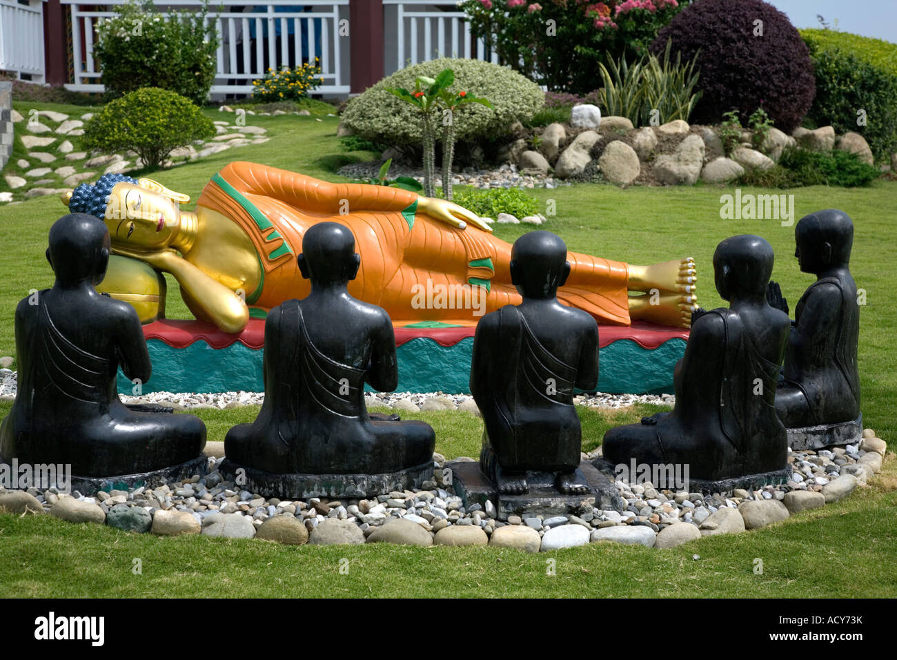 Lord Buddha and disciples sculptures. German Buddhist monastery. Lumbini. Nepal Stock Photo