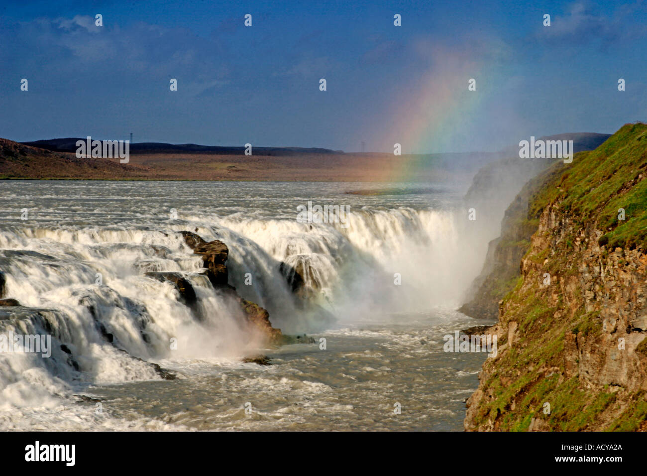 Iceland Gulfoss waterfall sunset rainbow Stock Photo