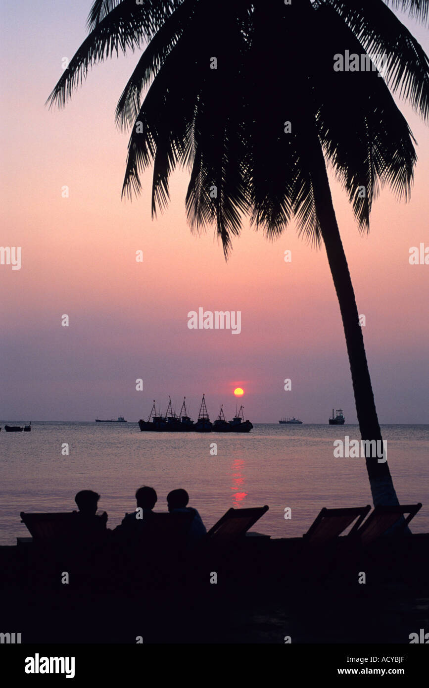 Fishing boats at sunset off the coast of Vung Tau, Vietnam. Stock Photo