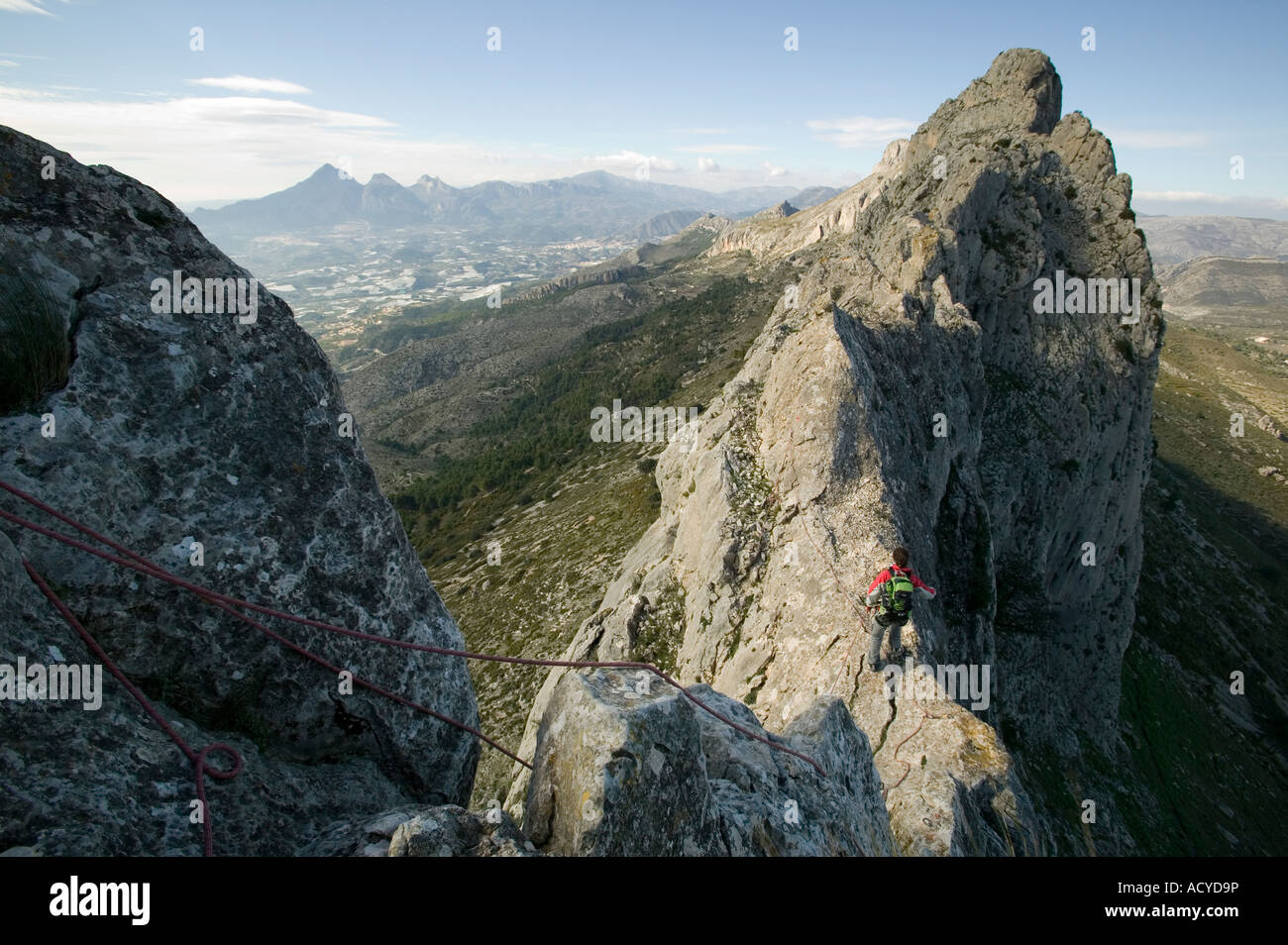 Female scrambler descending section of Bernia Ridge Costa Blanca Spain ...