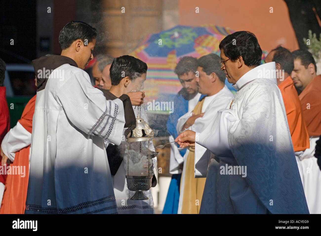 PRIEST and choir boys in front of the TEMPLO DE SAN FRANCISCO during