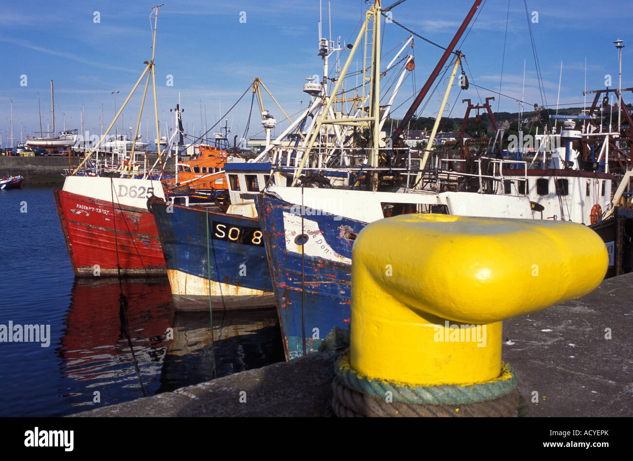 Fishing trawlers at the harbour of Howth near Dublin Ireland Stock