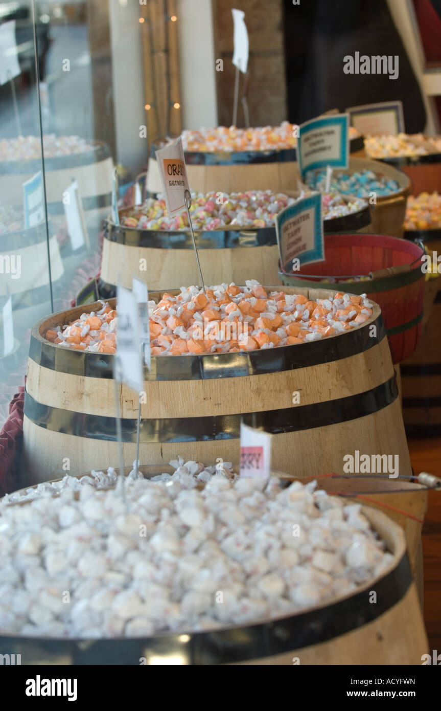 Barrels of taffy style candy for sale at a sweets candy at Balboa