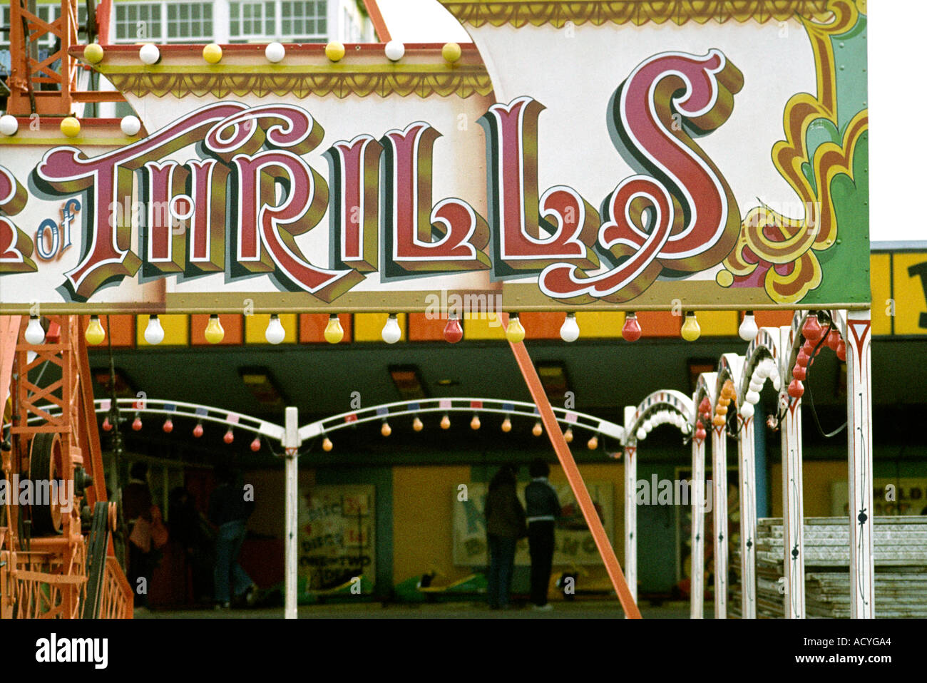Wales Barry Island seaside fairground ride thrills sign Stock Photo
