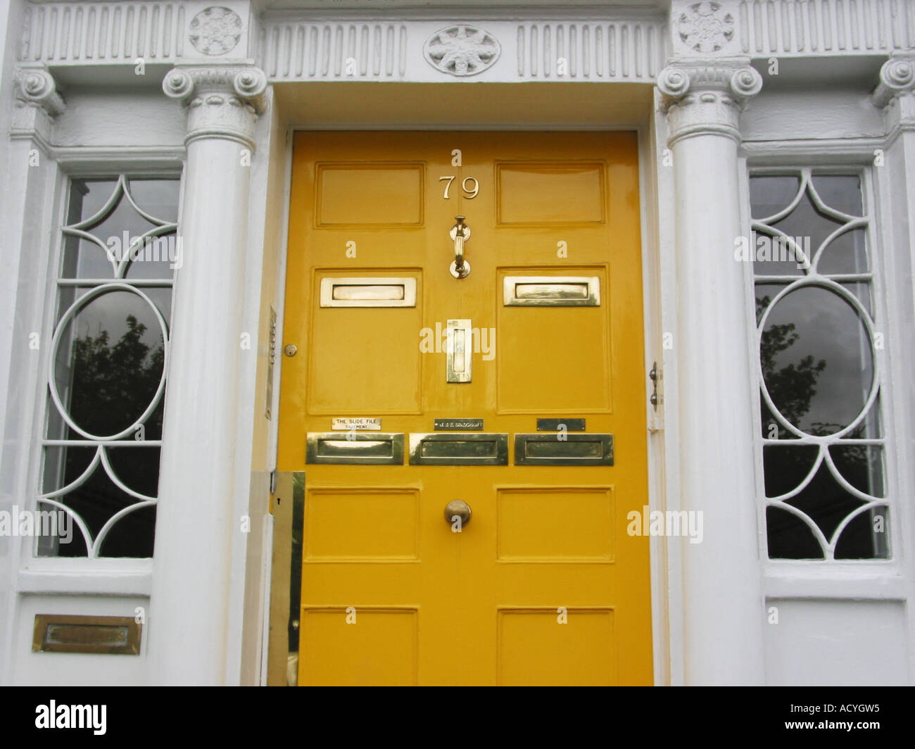 Traditional yellow front door Dublin Merrion Square Ireland
