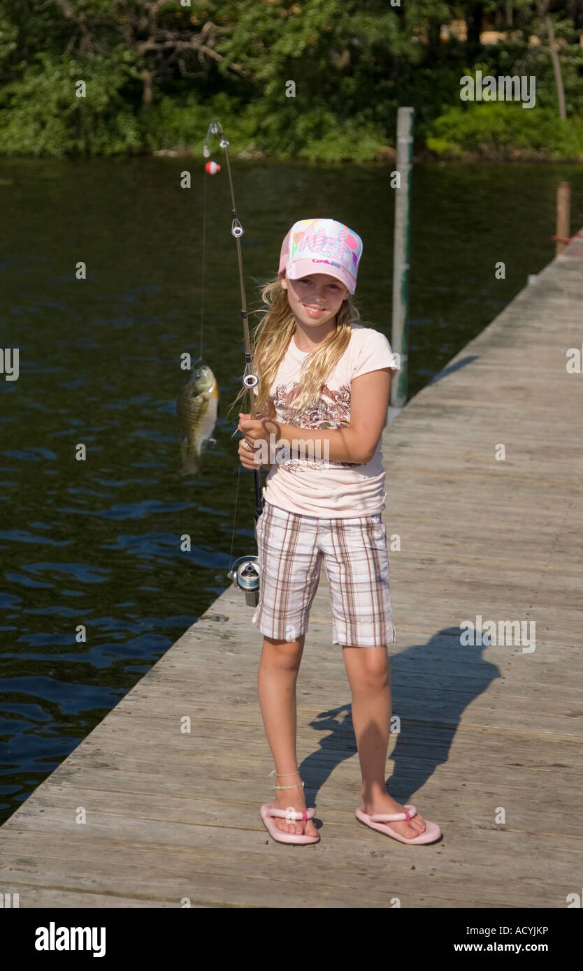 Child girl dock fishing hi-res stock photography and images - Page 2 - Alamy