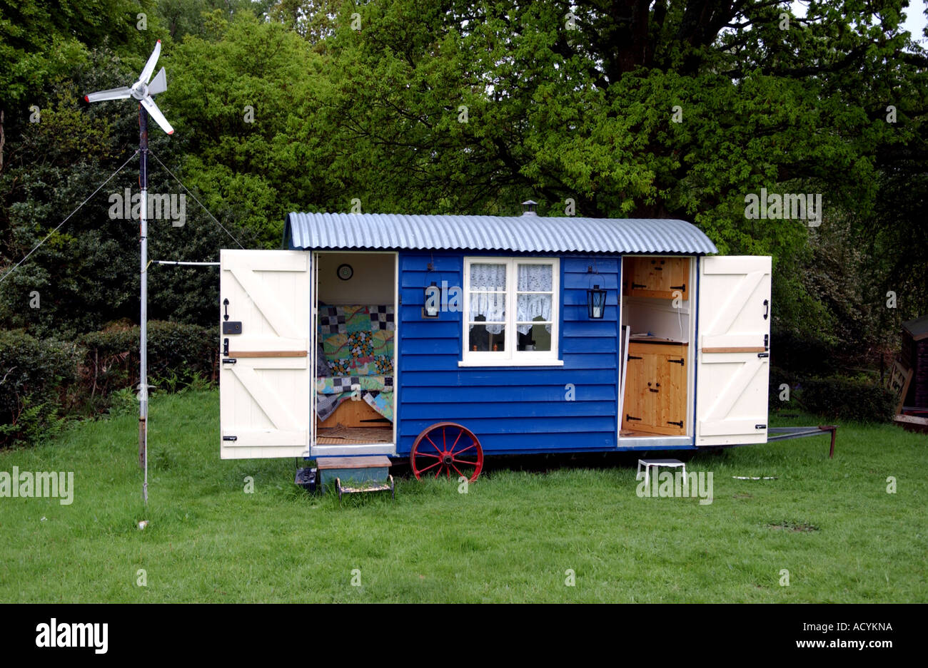 A traditional shepherds hut beside Nutley windmill on the edge of Ashdown Forest in Sussex Stock Photo