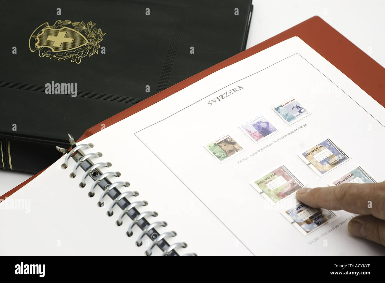 a Swiss stamp collection of stamps in an album Stock Photo