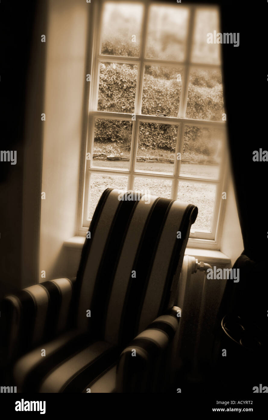 chair in window Stock Photo - Alamy