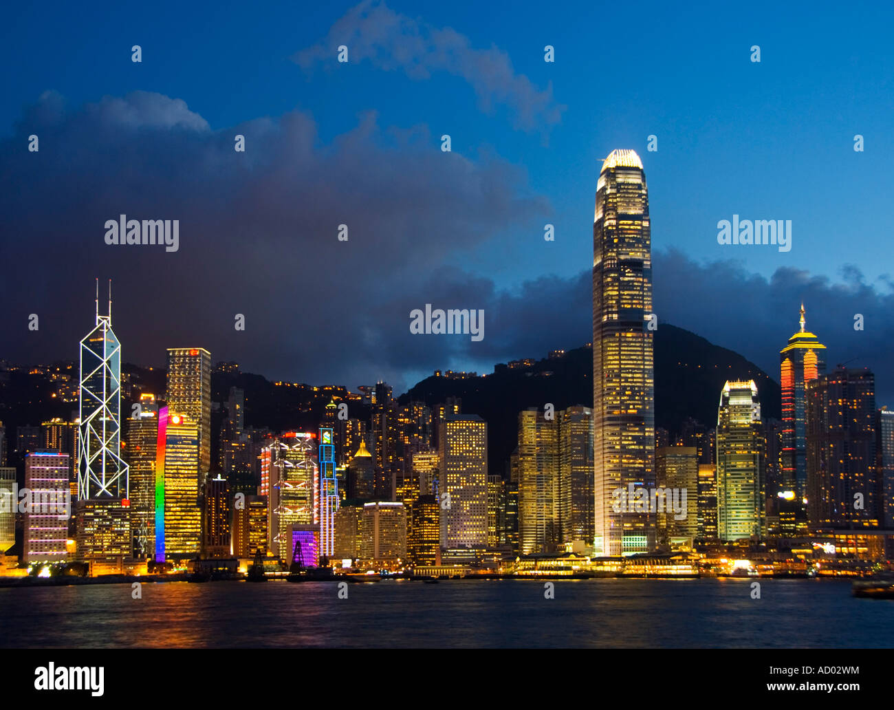 Evening view across Victoria Harbour to skyscrapers on Hong Kong Island Stock Photo