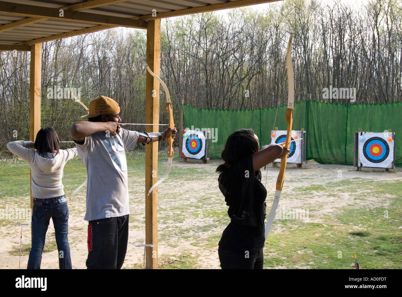 Young people at archery practice, England UK Stock Photo - Alamy