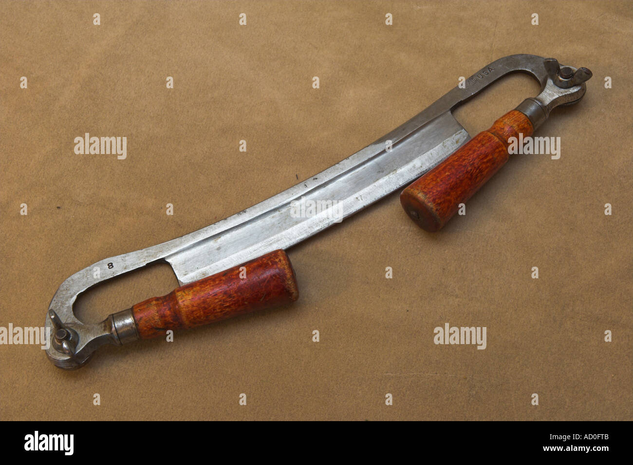 Drawknife with folding handles folded closed by Pexto USA Stock Photo