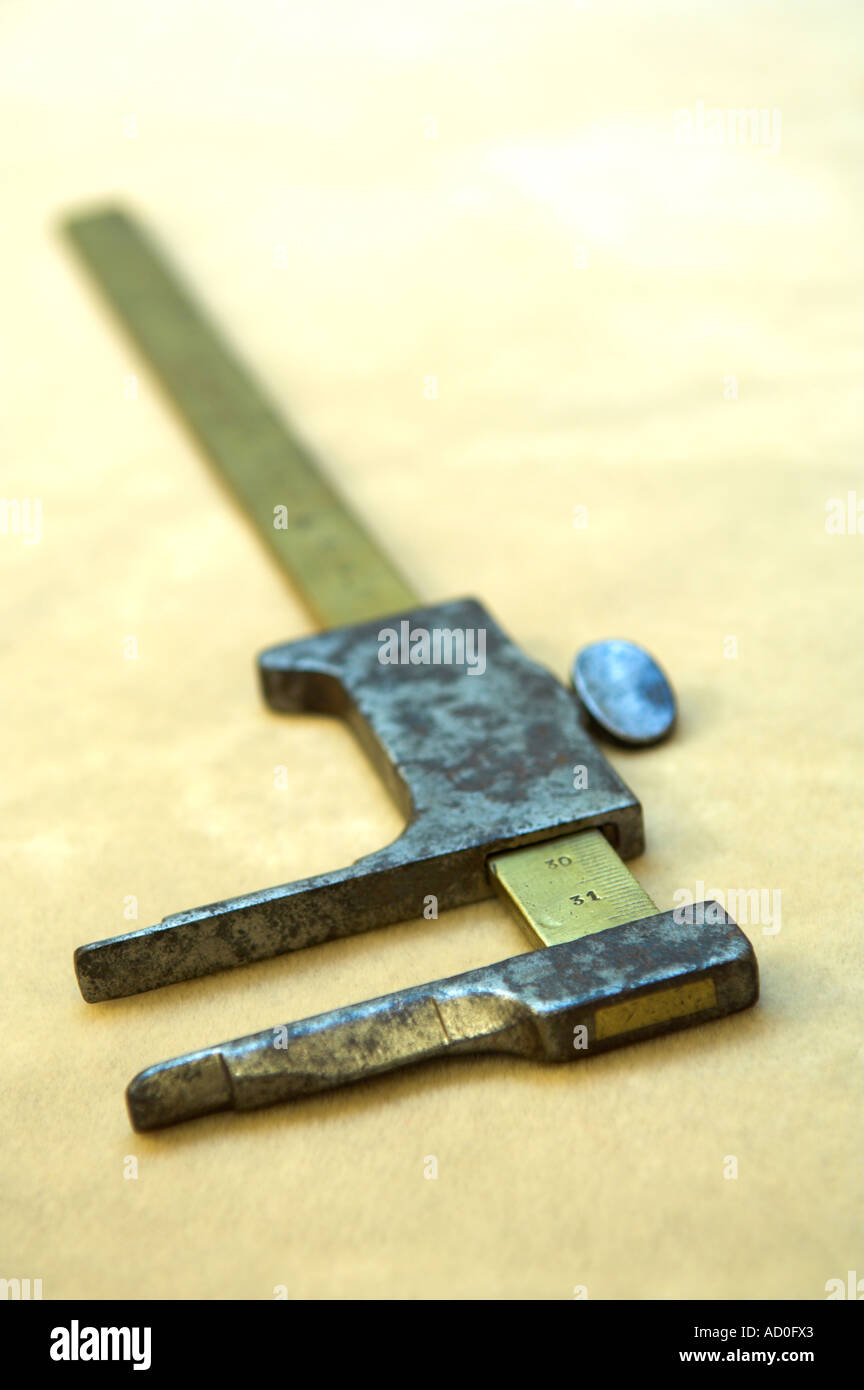 Antique pair of measuring calipers Stock Photo Alamy