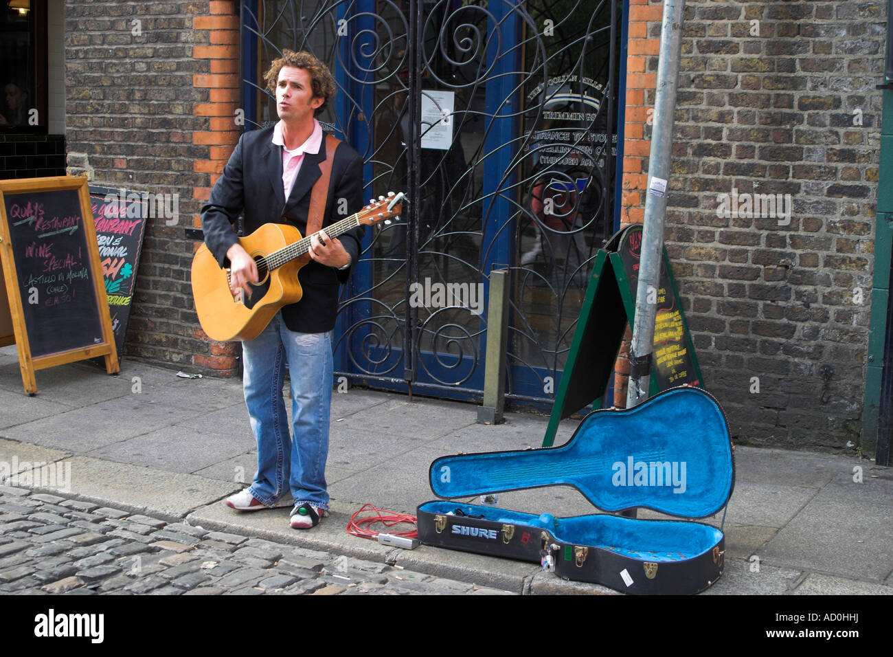 Temple Bar Busker A busker in Temple Bar with an open guitar case