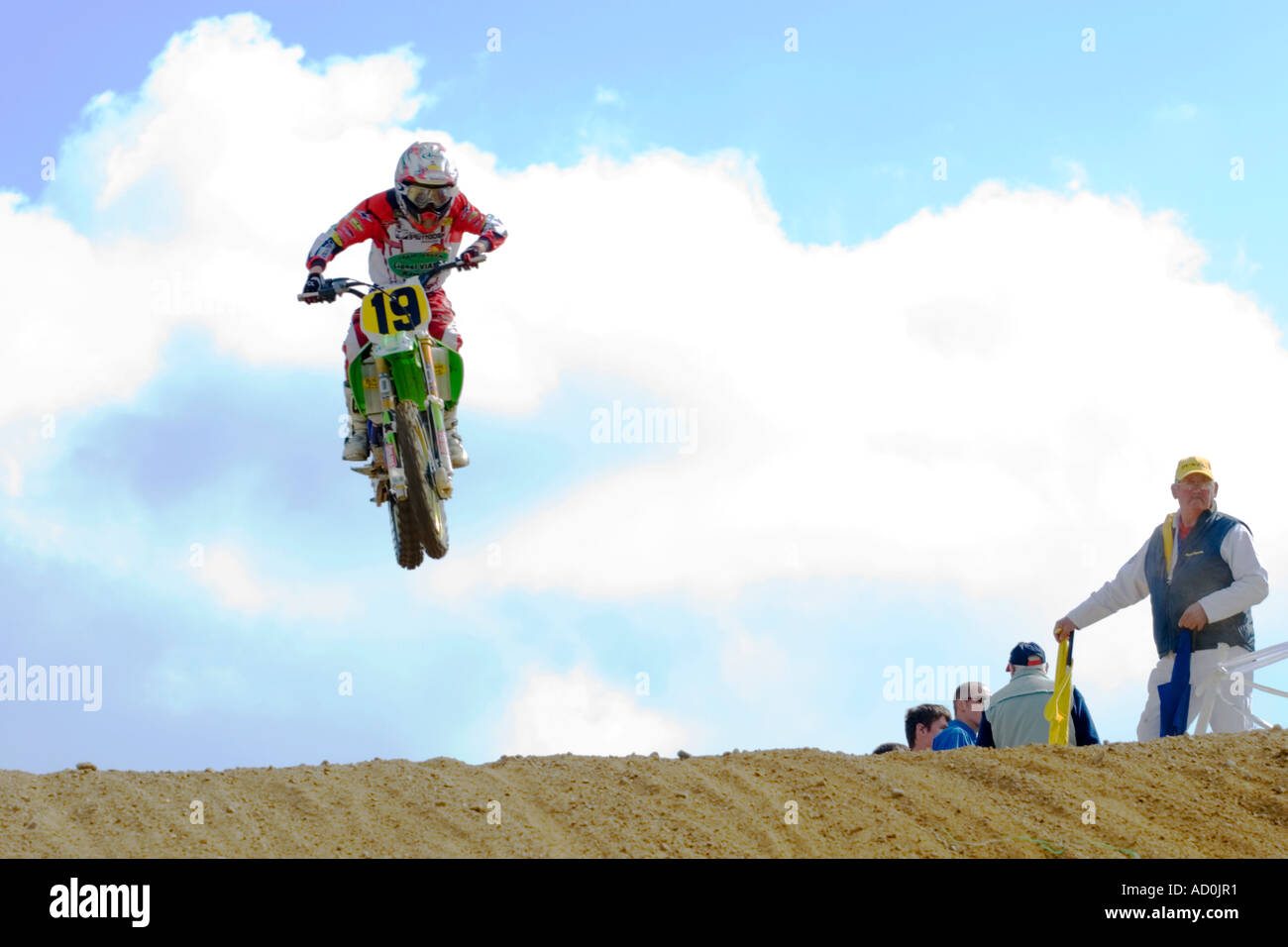 Young moto cross rider in mid air jump at the World Mini Trophy 2006 in  Jamoigne Belgium Stock Photo - Alamy