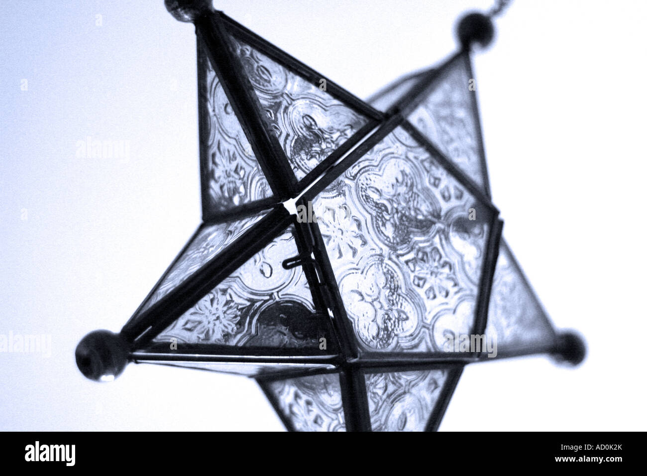 Hanging glass star shape candle holder Stock Photo Alamy