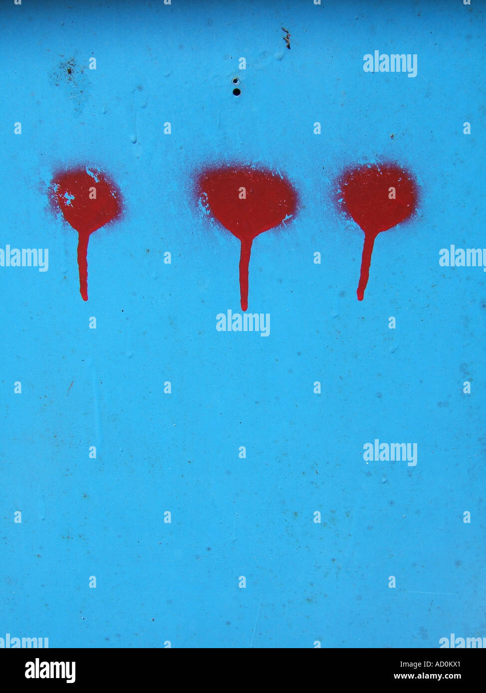 three red wet paint spots Stock Photo Alamy