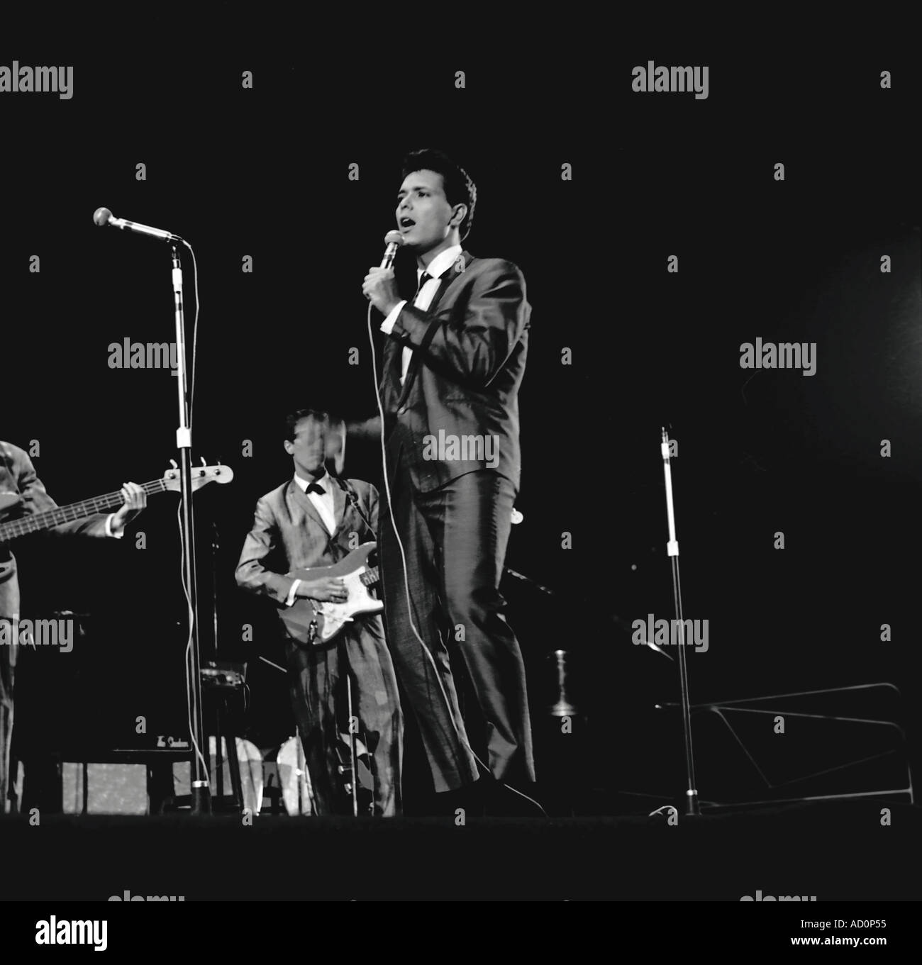 Cliff Richard, with band, performing at the Palladium. Photo by Harry Hammond, UK, 1961. Stock Photo