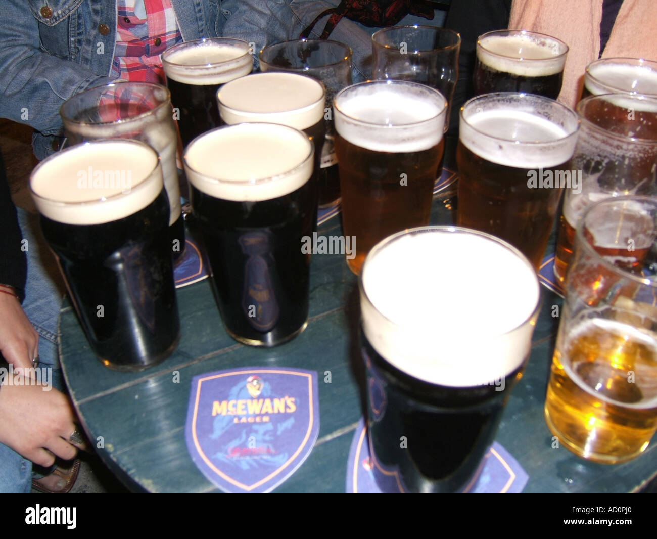 many pints of beer on pub table Stock Photo Alamy
