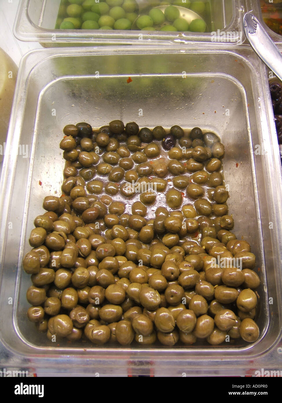 green olives in grocery store in italy Stock Photo Alamy