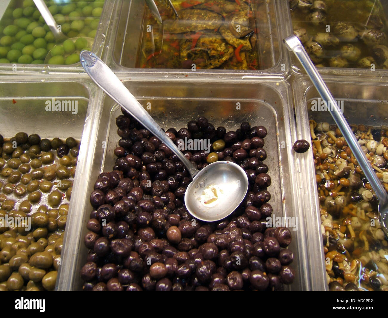 black olives in grocery store in italy Stock Photo Alamy
