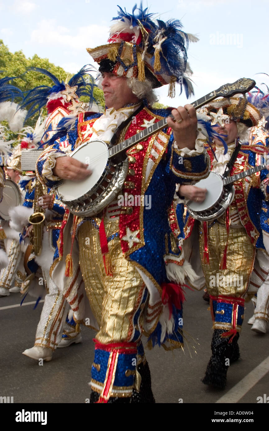 Banjo player from Quaker String Band marching in 4th of July parade