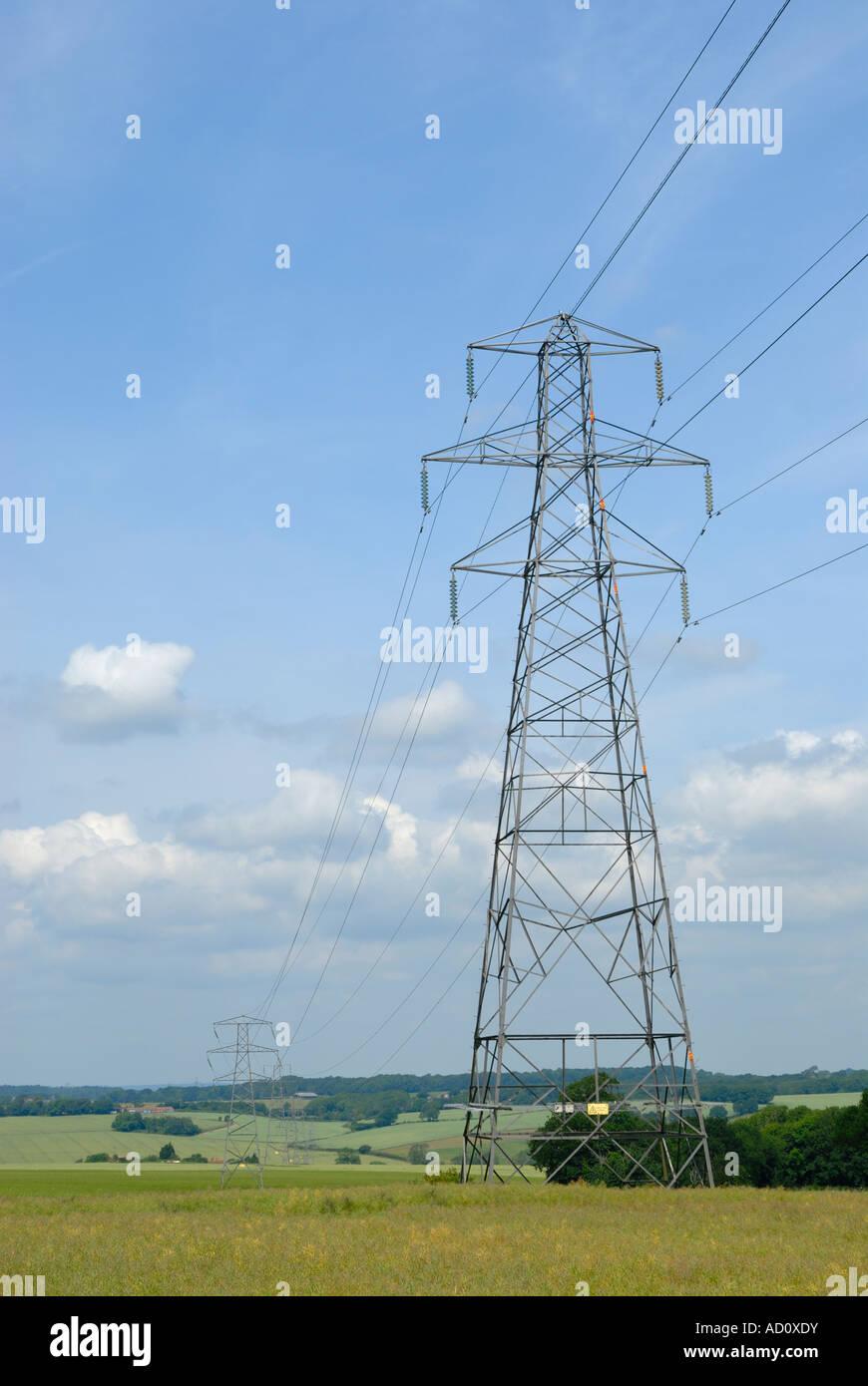 Power cable carrying pylon in the english countryside Stock Photo - Alamy