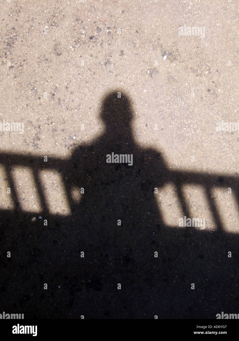 man's shadow on bridge Stock Photo - Alamy
