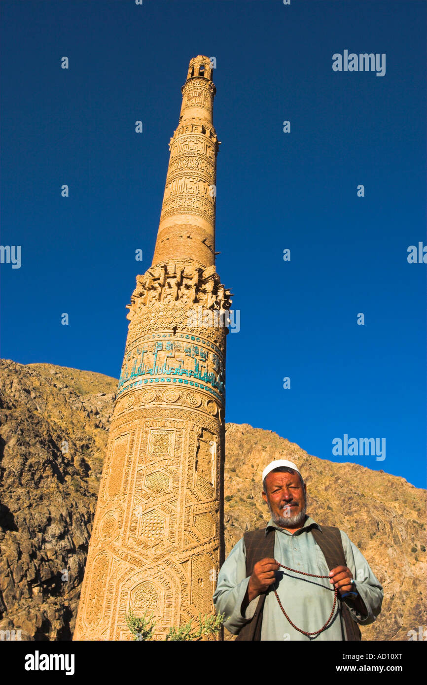 Afghanistan, Ghor Province, Afghani man infront of 12th Century Minaret of Jam Stock Photo