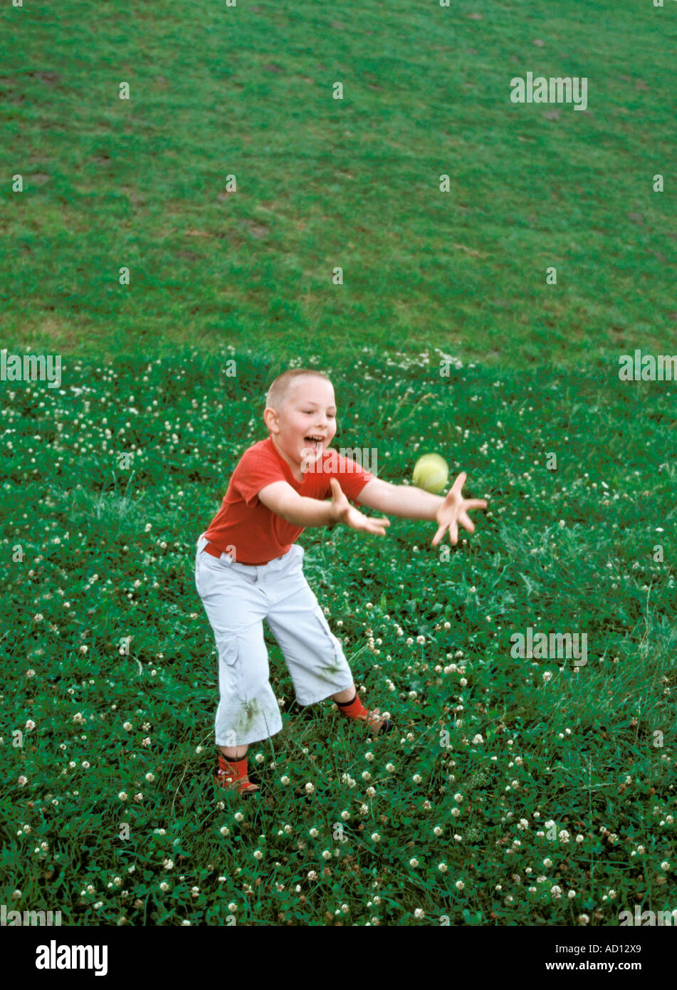 boy playing with ball Stock Photo - Alamy