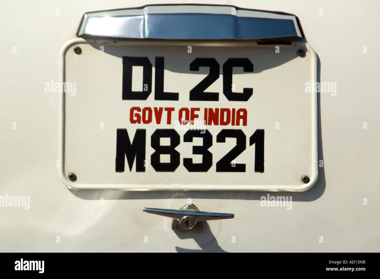 India Haryana Delhi April 2006. Horizontal close up of a number plate on a sparkling white Ambassador car Stock Photo