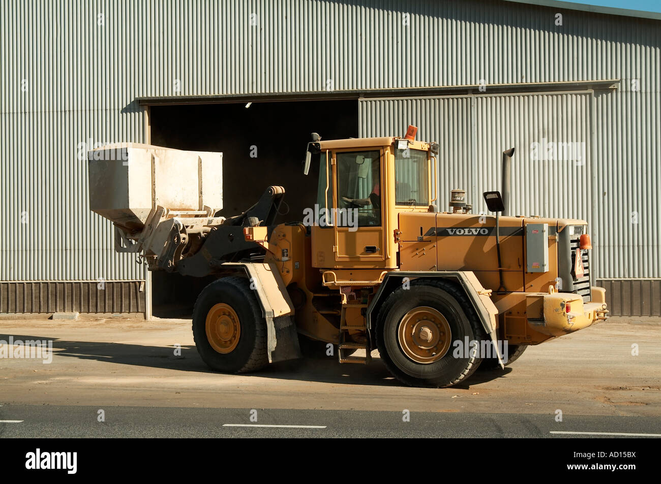 volvo, digger, earth, mover, earthmover, heavy, industry, industrial, scoop, bucket, diesel, yellow, big, lift, Stock Photo