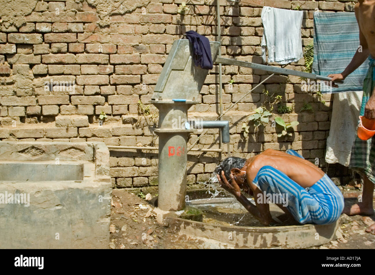 Wet alleyway in indian city hi-res stock photography and images - Alamy