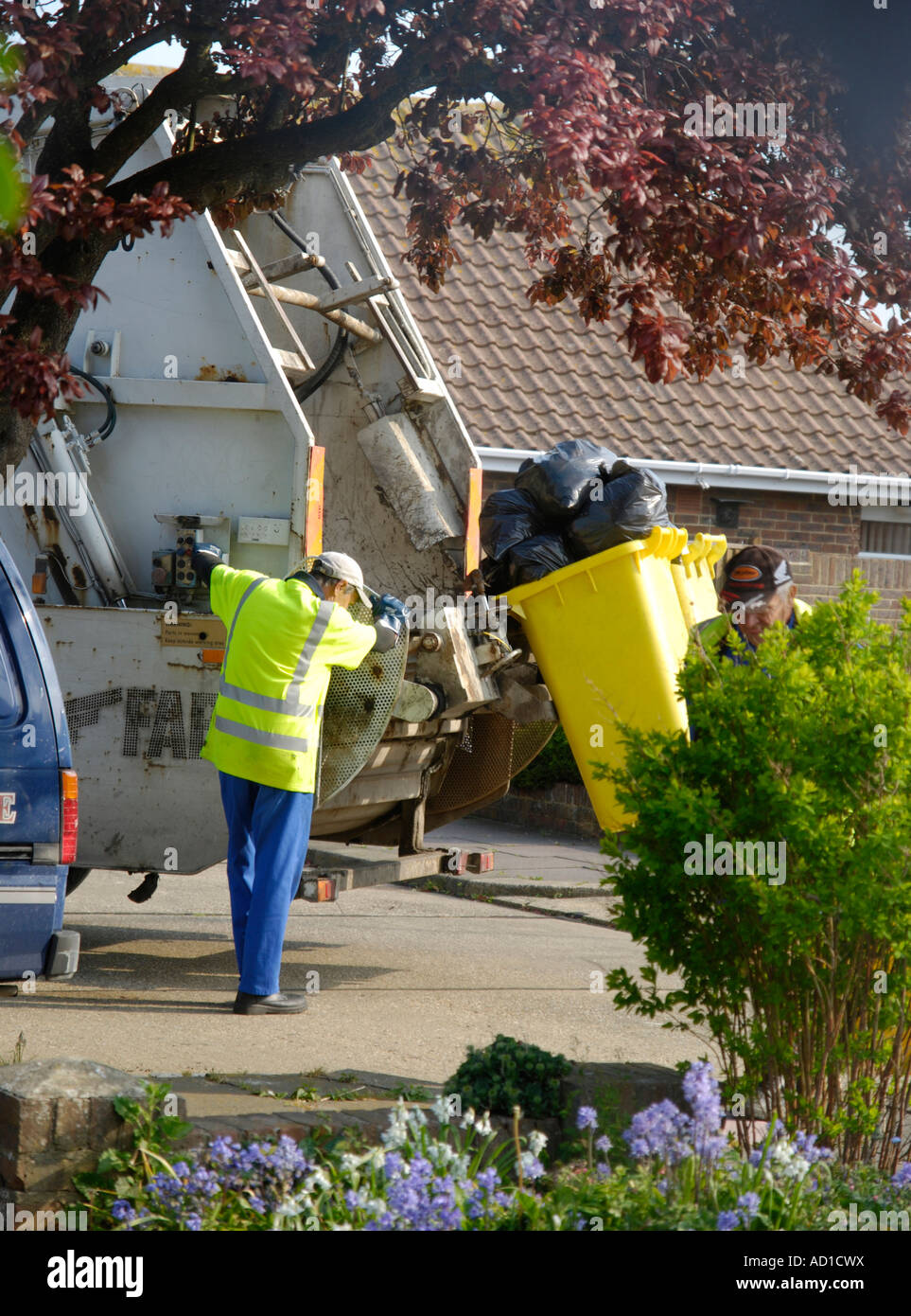 dustmen collecting rubbish Worthing Adur area West Sussex Stock Photo