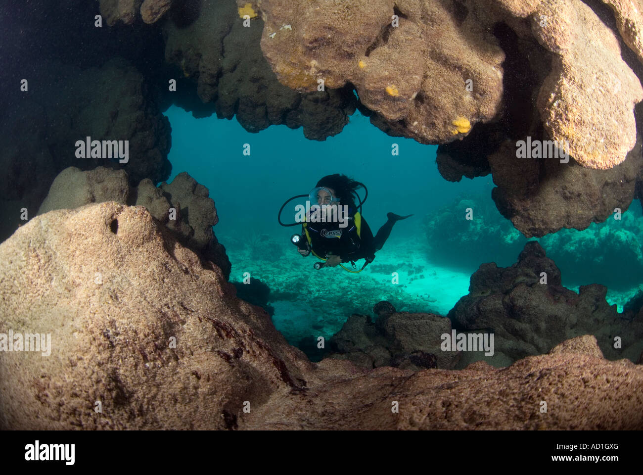 underwater cave in Anegada British Virgin Islands BVI, underwater, scuba, diving, ocean, sea, cavern, hole, blue water, Stock Photo