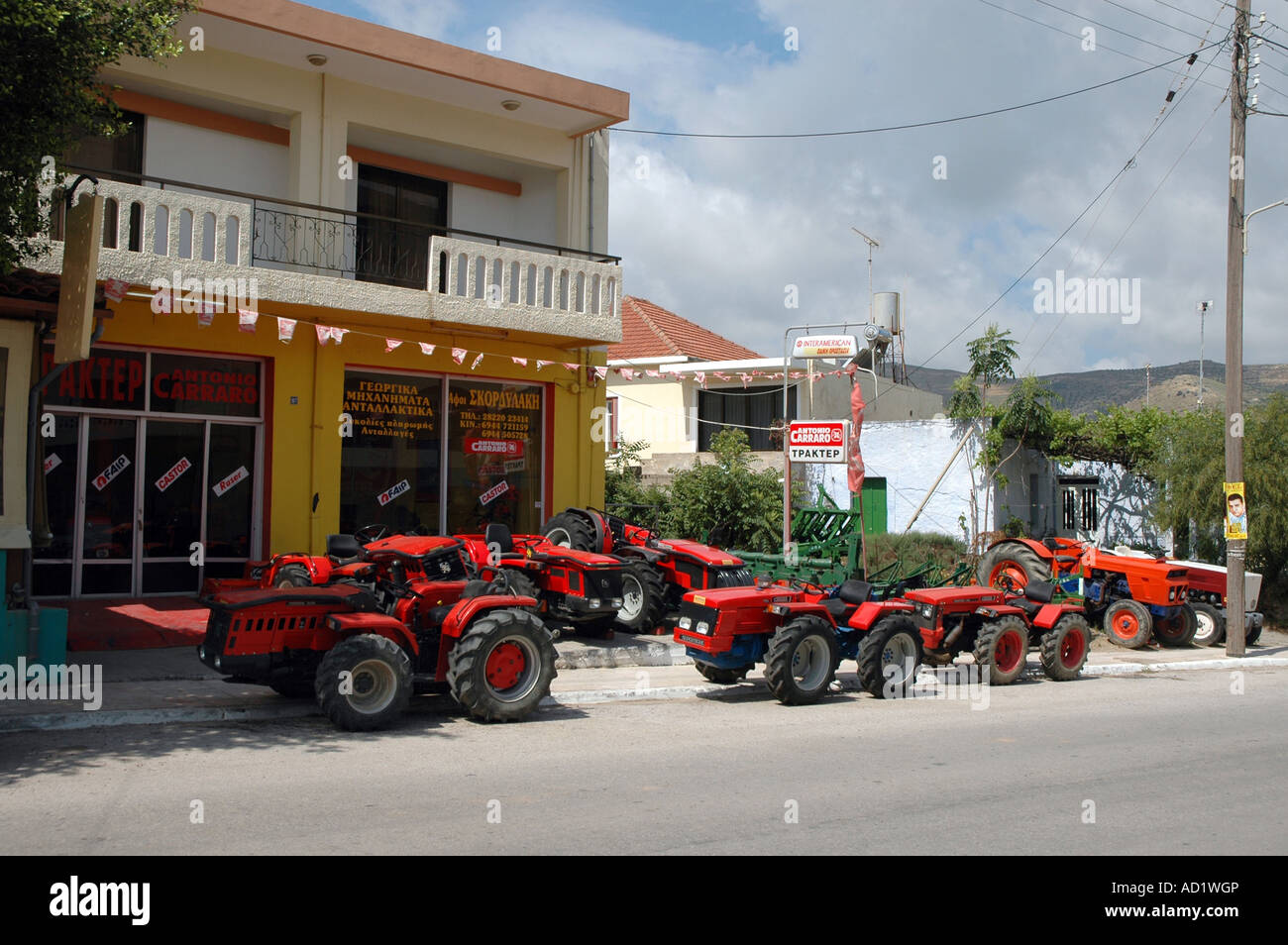Shop with small Antonio Carraro compact tractors in Kissamos town, greek isle of Crete Stock Photo