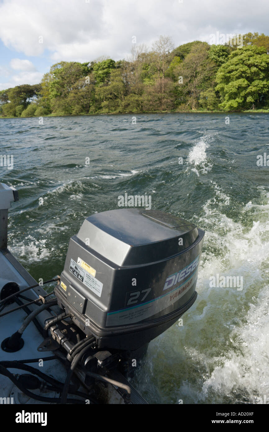 Outboard motor on Scottish loch Stock Photo Alamy