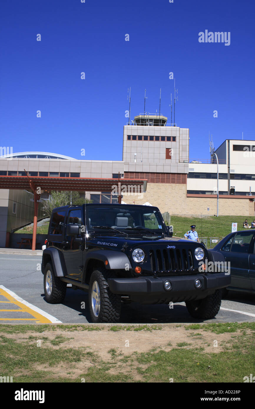 black Jeep Wrangler Rubicon parking outside of Halifax Airport entrance